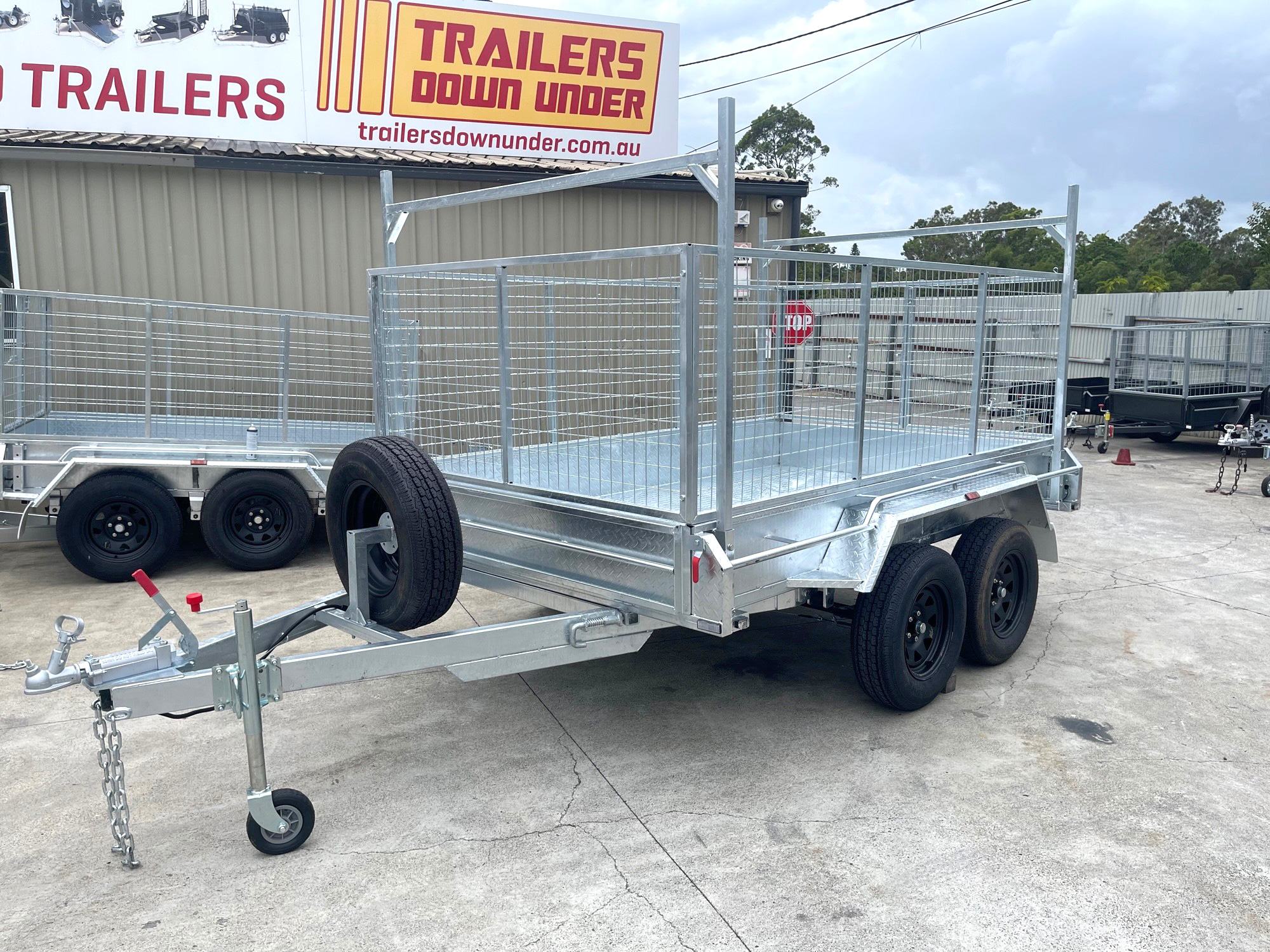 Tandem Axle Cage Trailer with Spare Mount and Racks